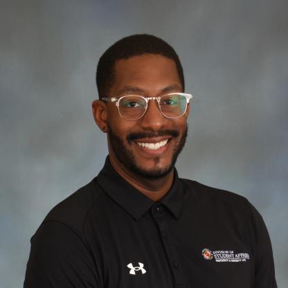 Devin Walker posing for a photograph