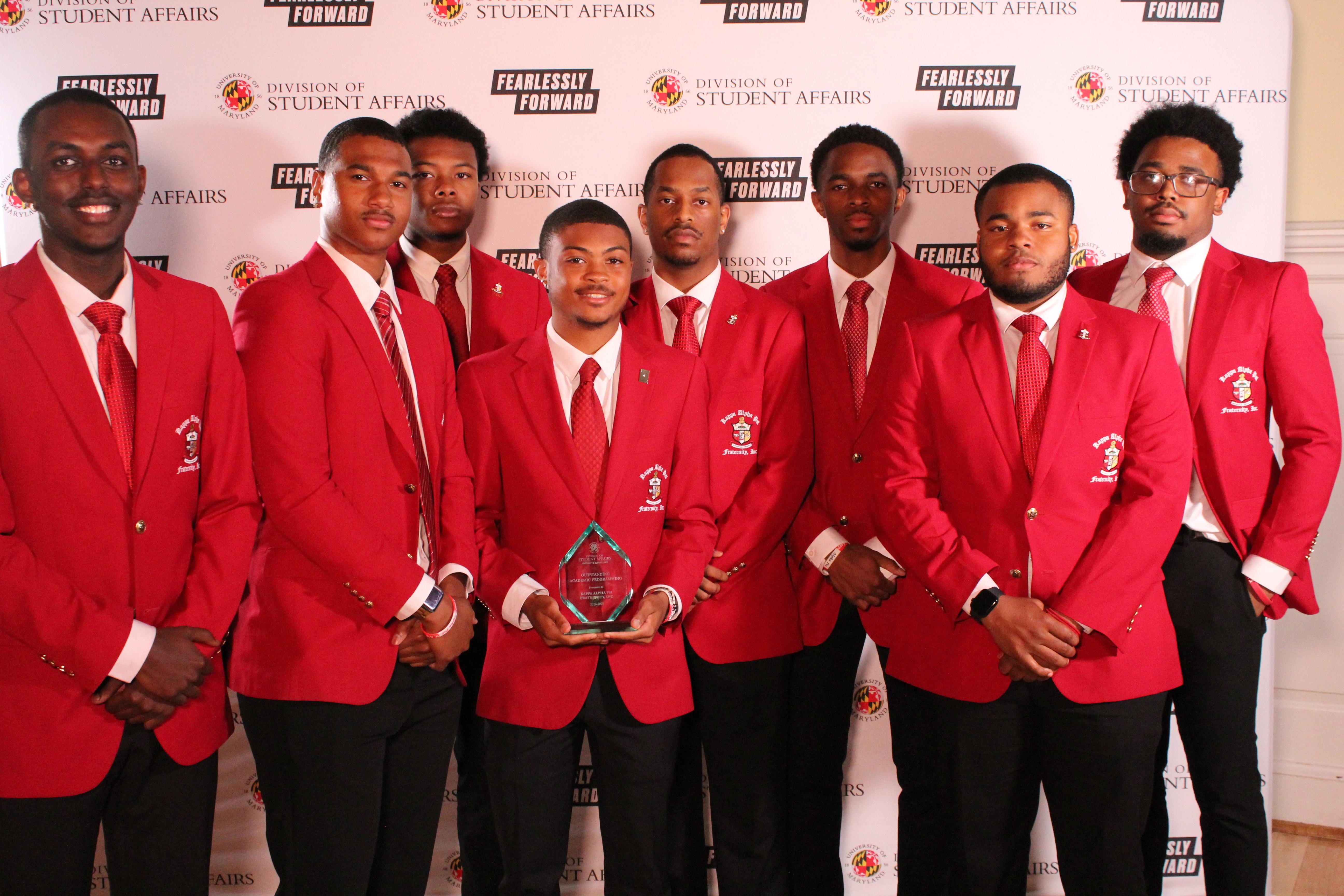 Kappa Alpha Psi Fraternity, Inc. members with award