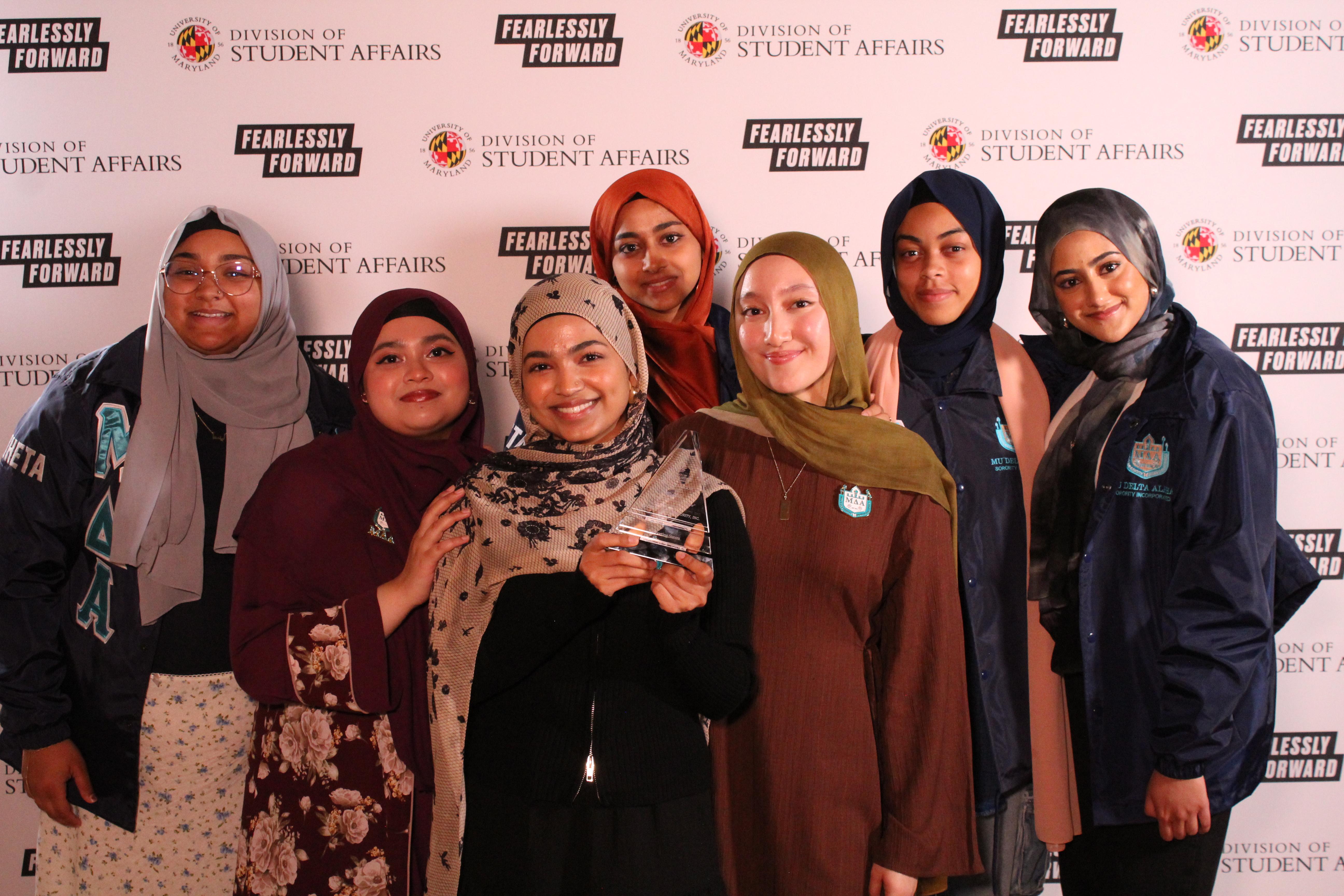 Mu Delta Alpha Sorority, Inc. members with Award