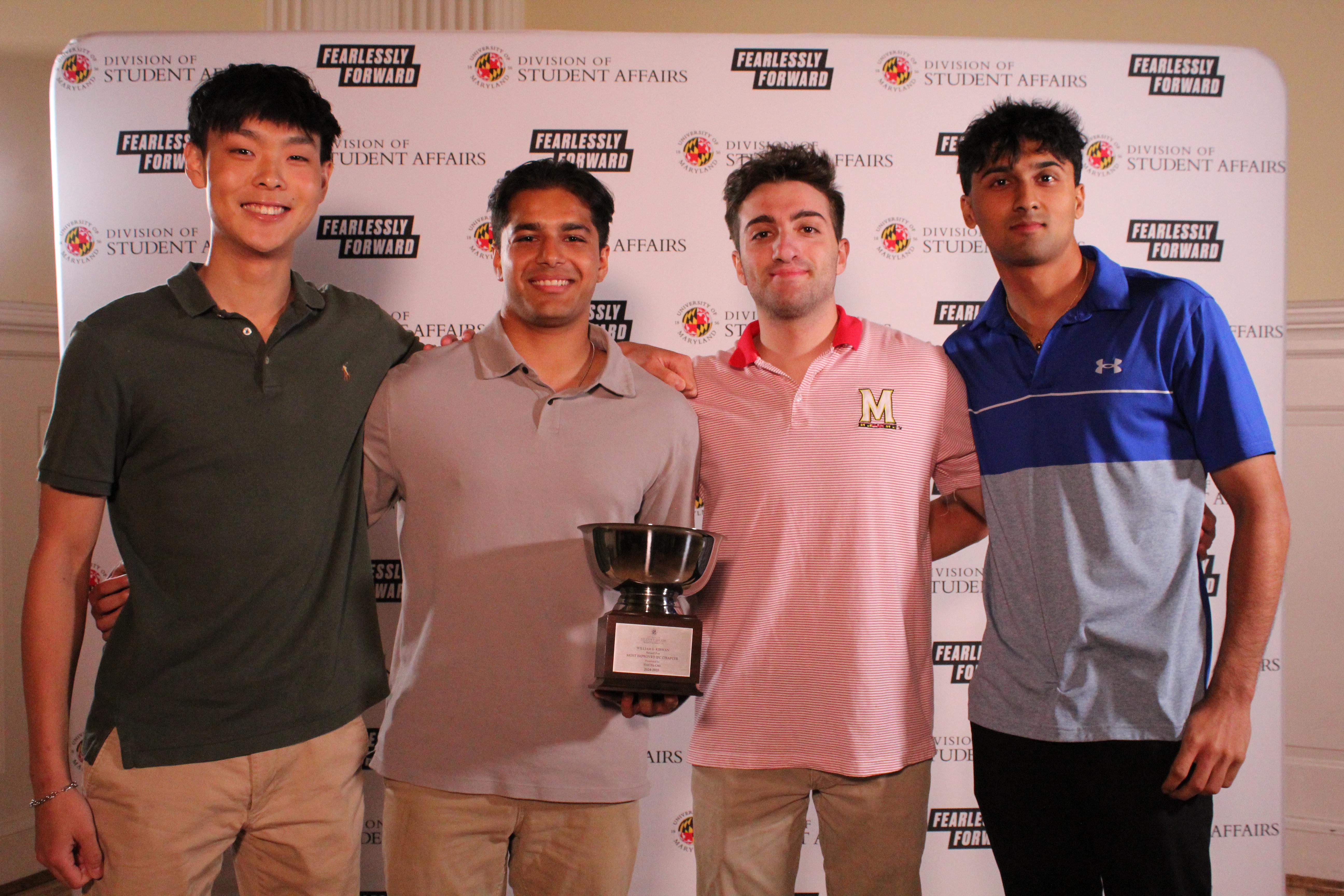 Members of Theta Chi Fraternity with Most Improved Chapter Award