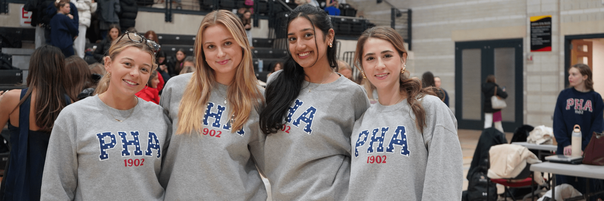 Group of four women standing together