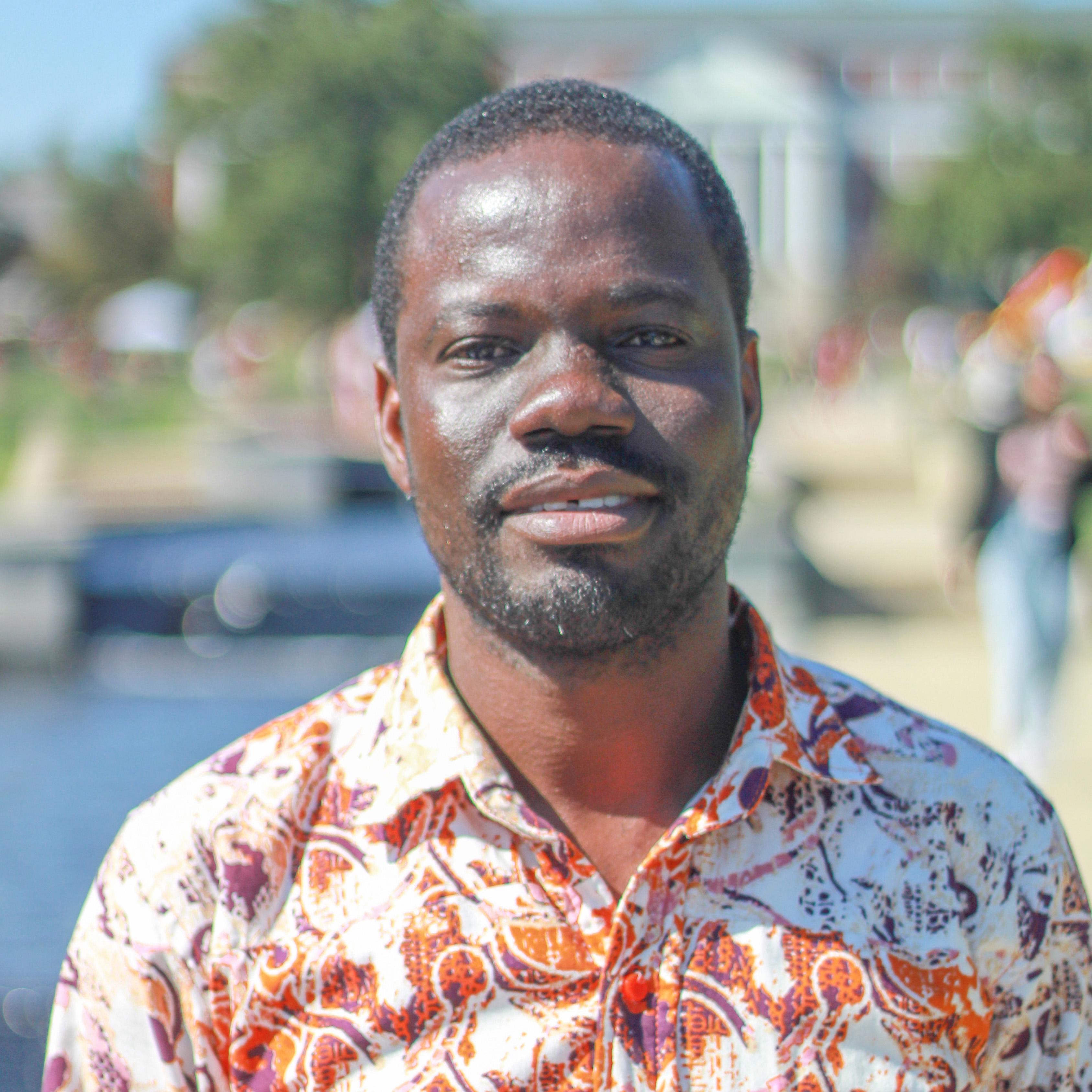 Portrait of Ebenezer Kobina Mensah (he/him)