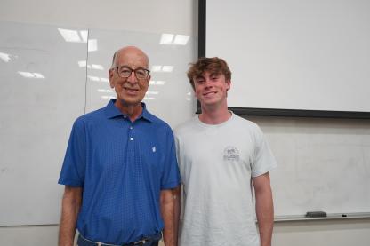 Two men standing together